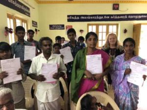 Believers in India with Bible study booklets
